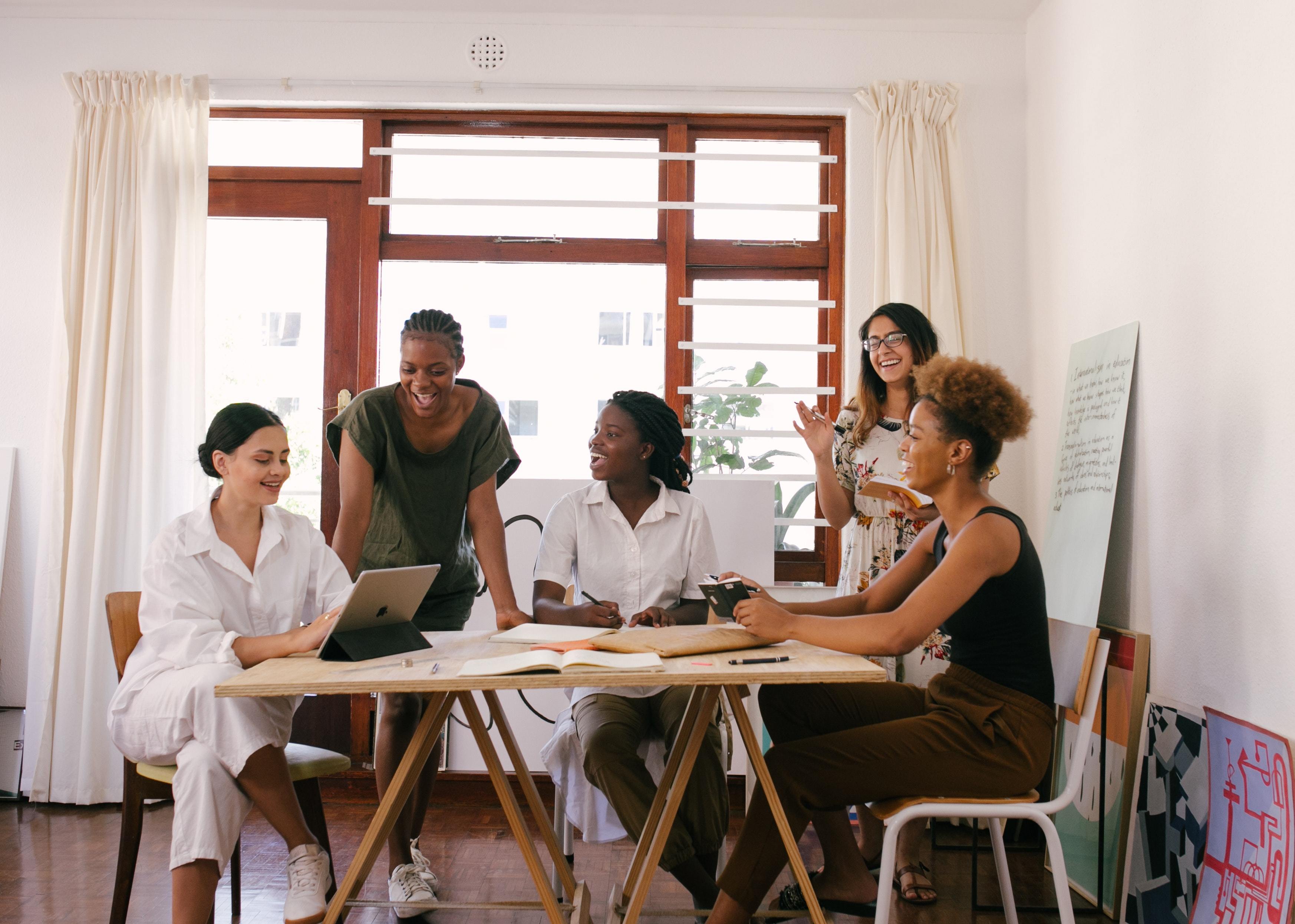 Group of women having a meeting 3810754